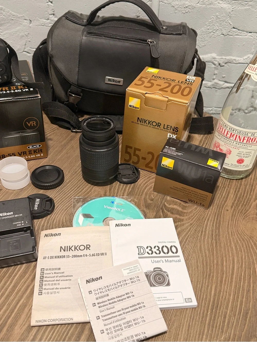 Nikon D3300 DSLR Bundle — 18-55mm + 55-200mm VR, WU-1a, Bag, Boxes — 4,627 Shots